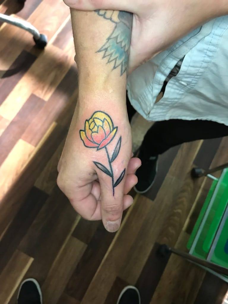 Orange Flower — Clay Walker Tattoo