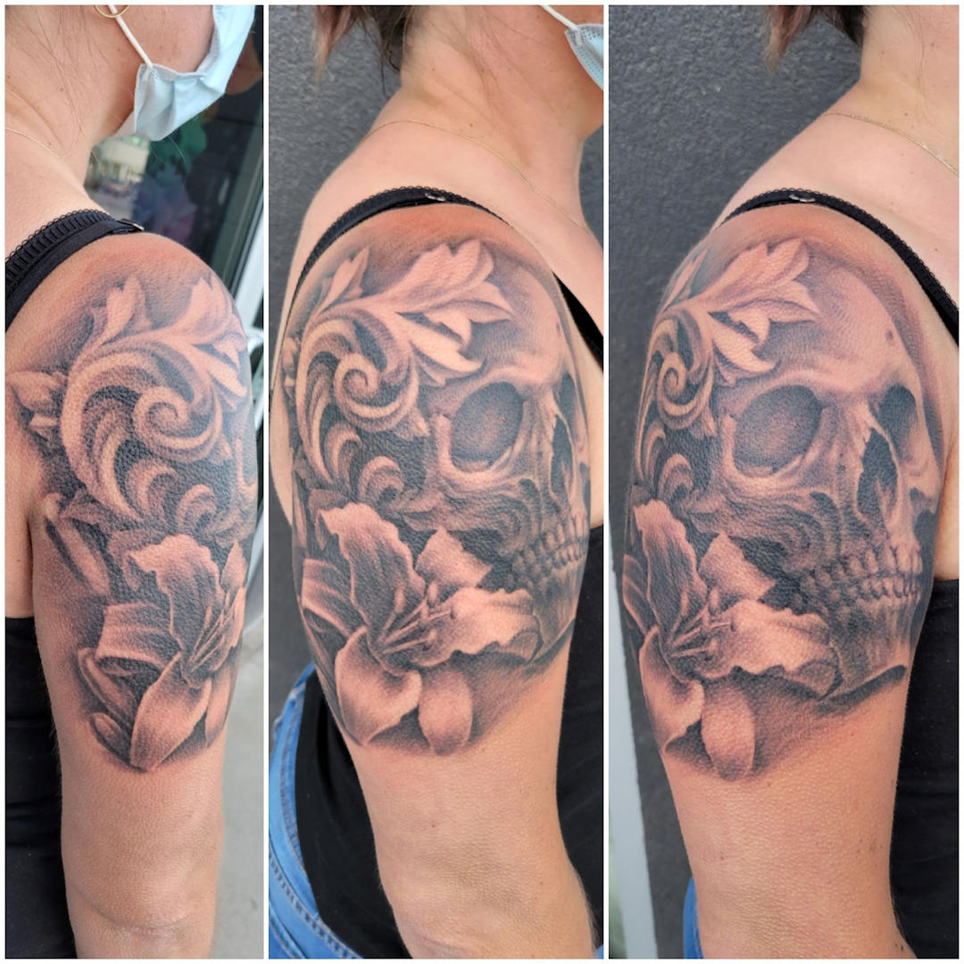 Filigree, Skull, and Flower â€” Clay Walker Tattoo