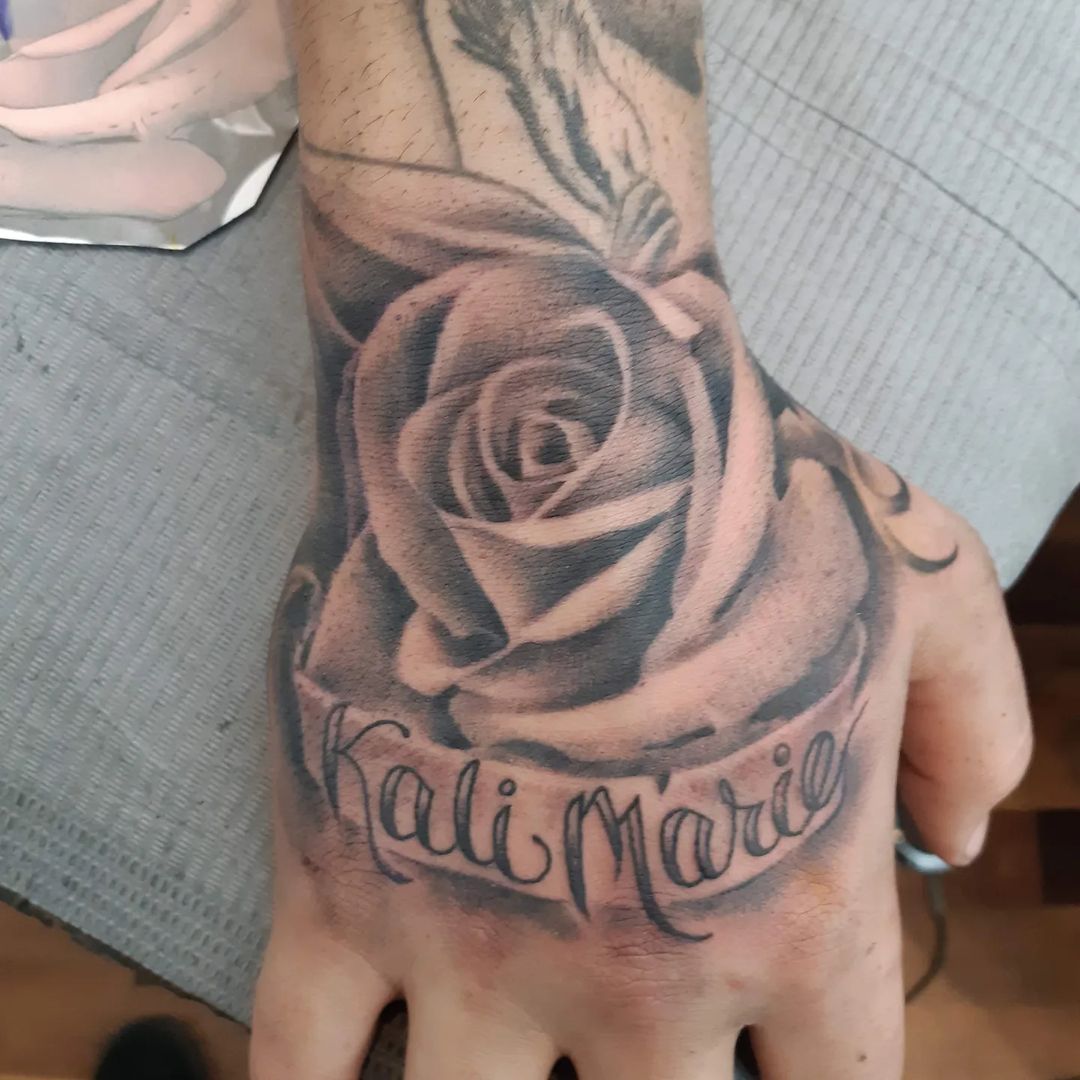 Hand Rose and Script â€” Clay Walker Tattoo