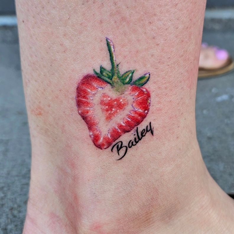 Strawberry Slice and Micro Script — Clay Walker Tattoo