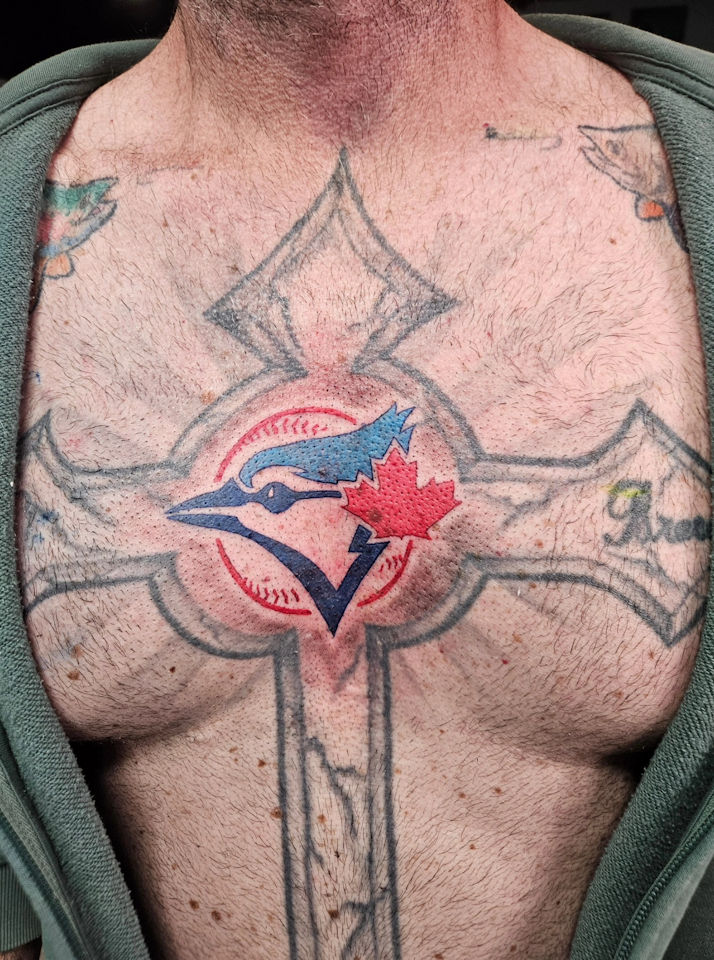 Blue Jays Sternum Blaster Tattoo — Clay Walker Blue Jays Sternum Blaster Tattoo