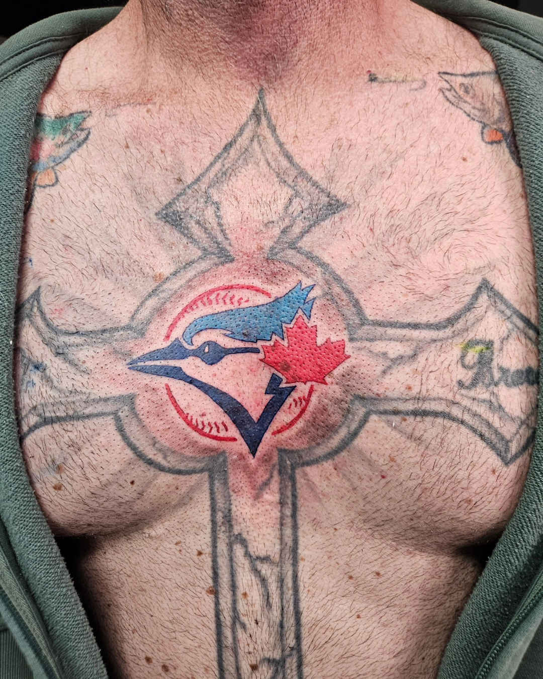 Blue Jays Sternum Blaster Tattoo — Clay Walker