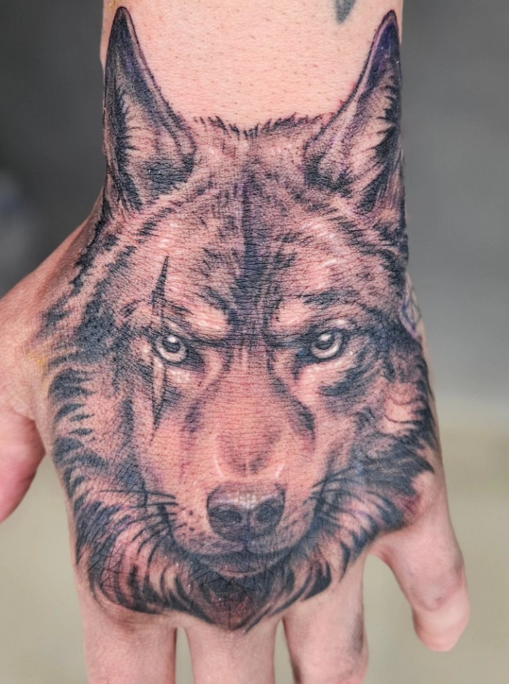 Wolf Hand Tattoo